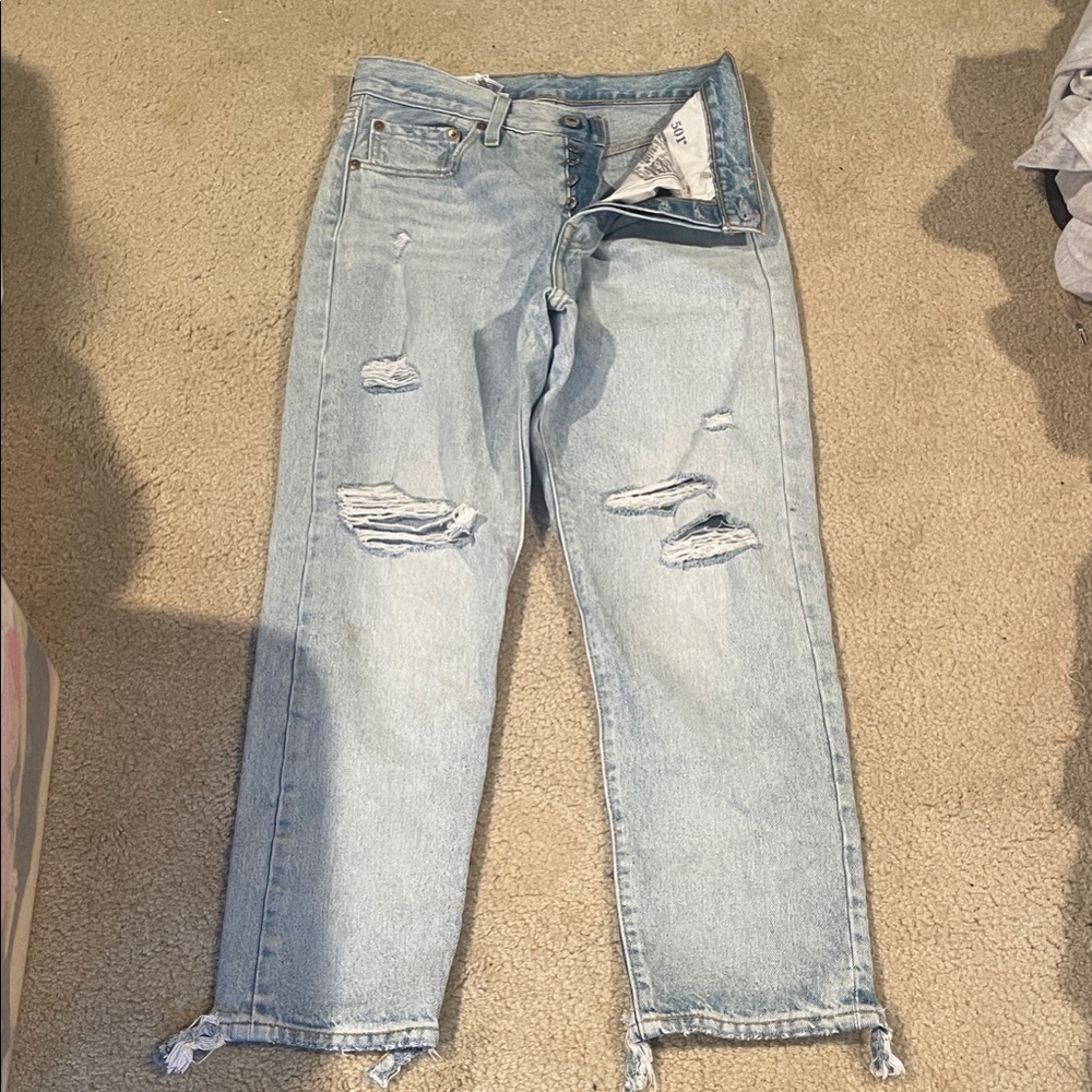Levi's Light Blue Straight Jeans with Distressed Details